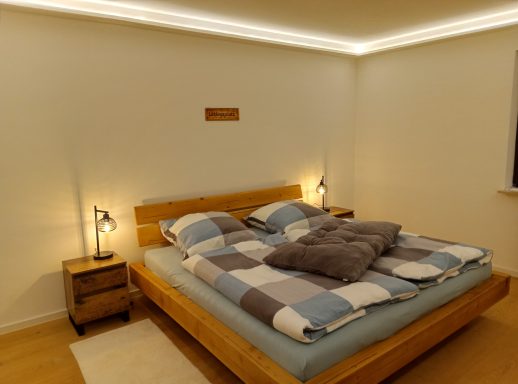 Blick ins Schlafzimmer - Ferienwohnung Wandersnest